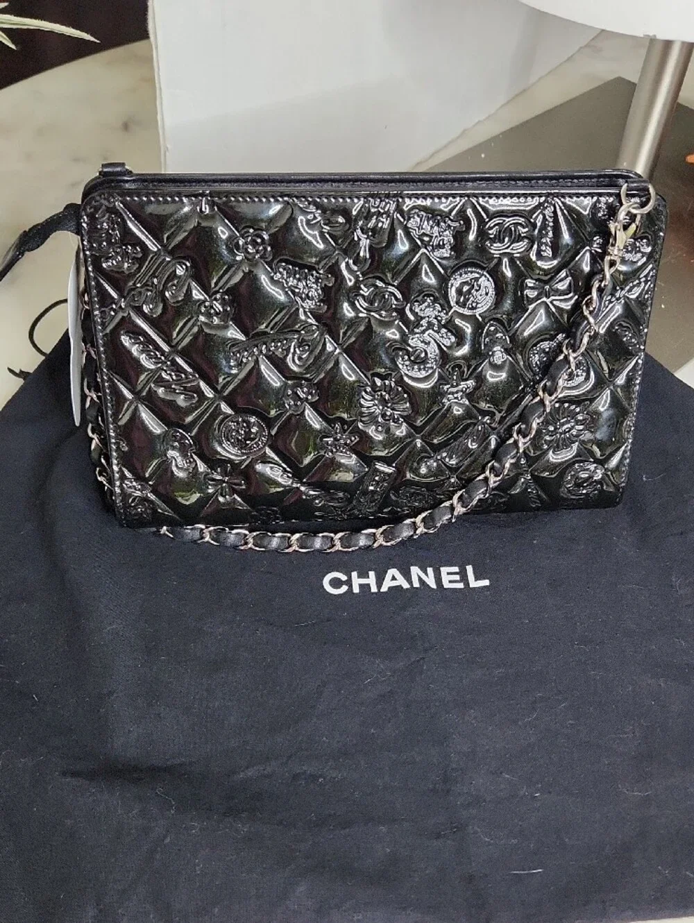 CHANEL Black Patent Quilted Floral Chain Wristlet